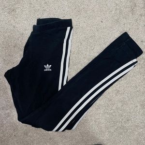 Adidas leggings. Size Medium in Woman’s or 8 in UK. Black with 3 white stripes.